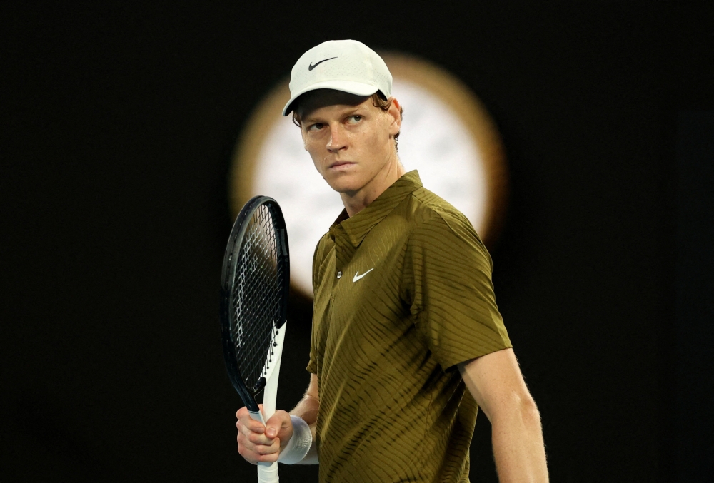  Italy's Jannik Sinner reacts during his quarter final match against Ben Shelton of the U.S.