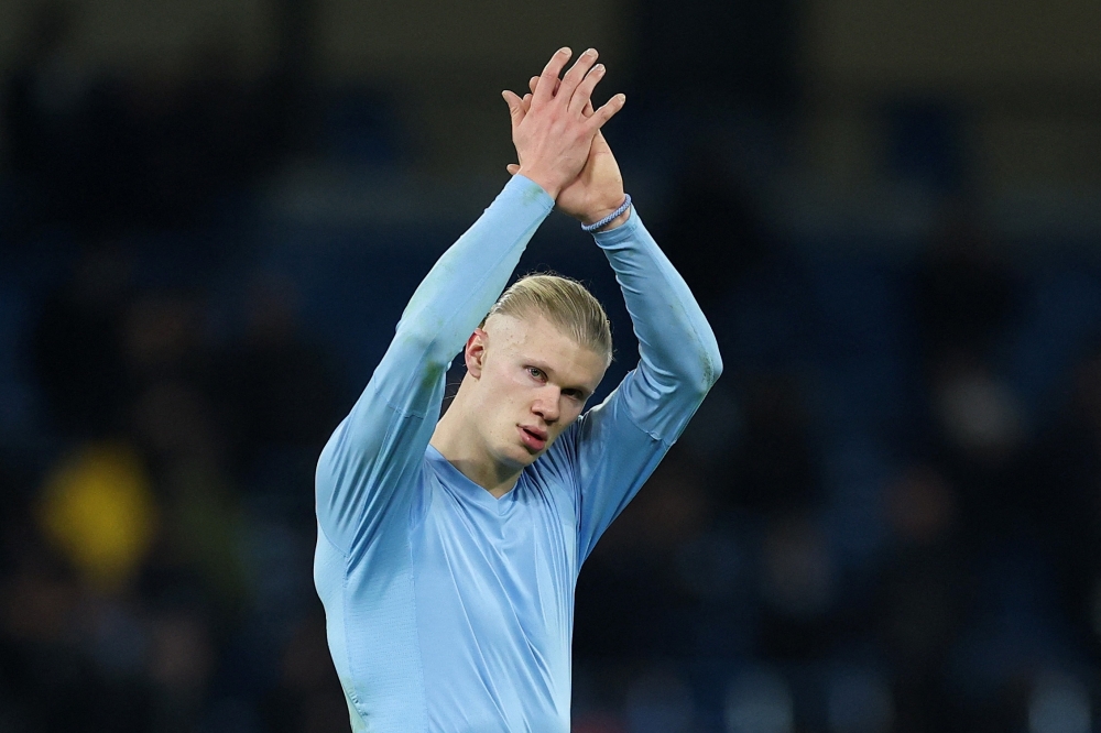 Manchester City's Erling Haaland applauds their fans after the match 