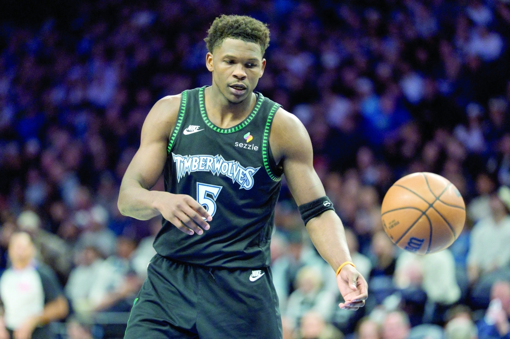 Minnesota Timberwolves guard Anthony Edwards (5) receives the inbound pass agains the Oklahoma City Thunder in the third quarter at Target Center 