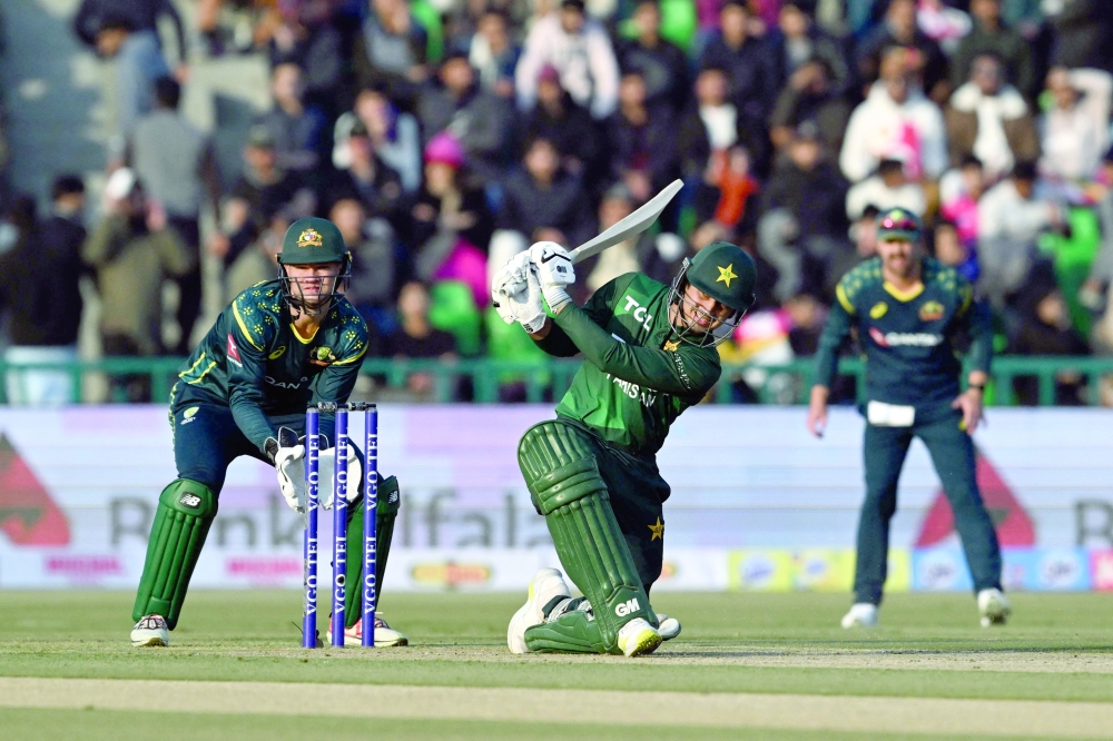 Pakistan's Saim Ayub plays a shot during the first Twenty20 international cricket match between Pakistan and Australia at the Gaddafi Stadium