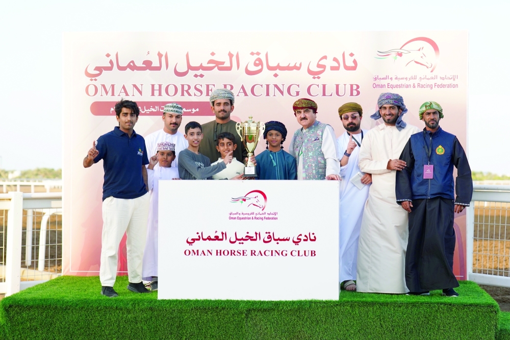 Crowning the winners of the eighth race for top-rated horses. — Photo by Mohammed al Balushi 