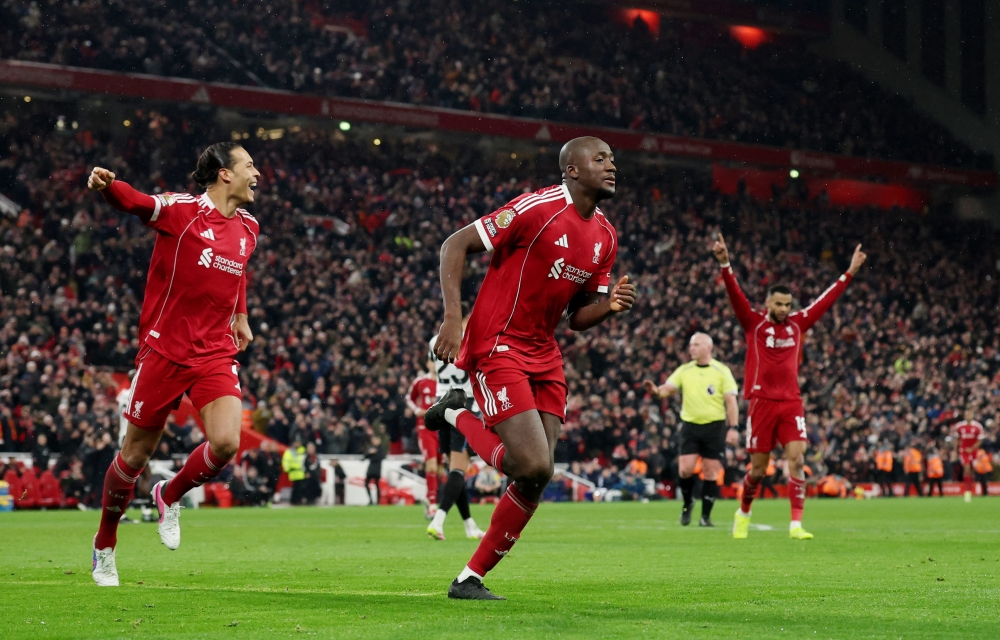   Liverpool's Ibrahima Konate celebrates scoring their fourth goal with Liverpool's Virgil van Dijk 