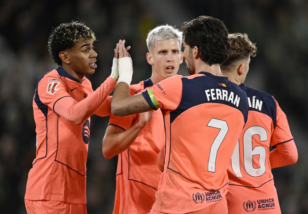 FC Barcelona's Ferran Torres celebrates scoring their second goal with teammates 