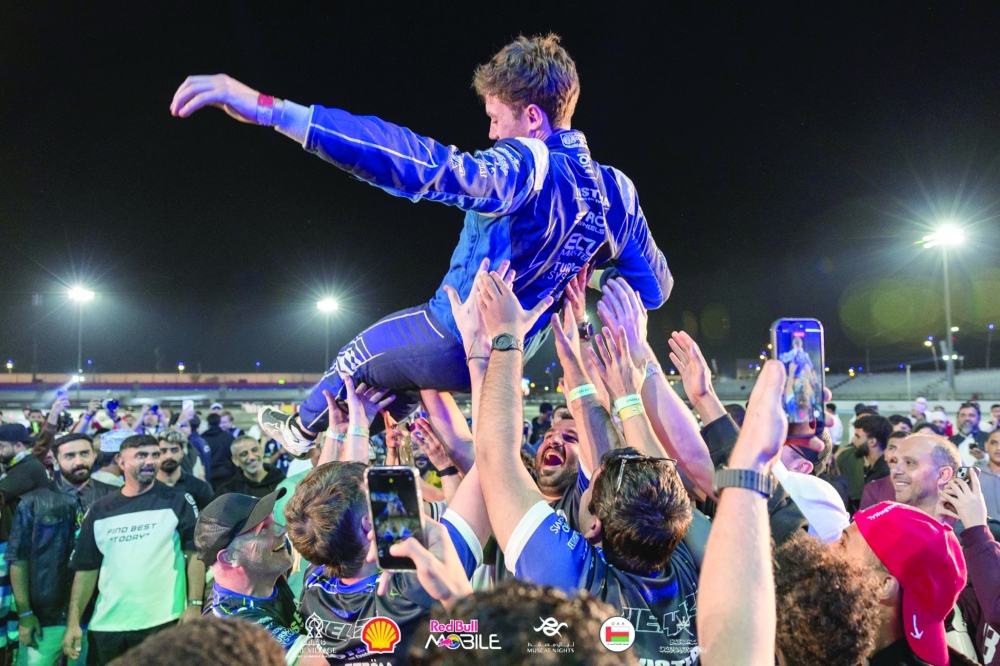 Celebrating with the winning player.