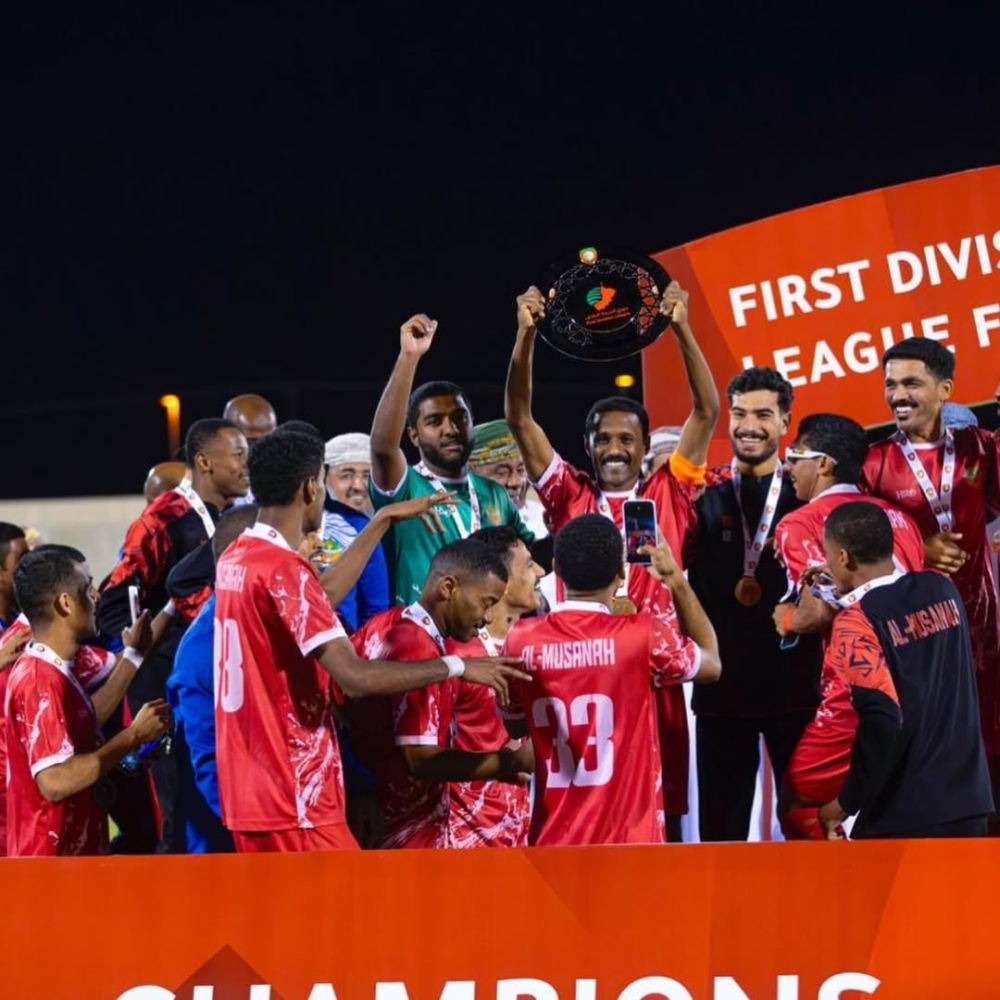 Al Musannah team celebrates their promotion to the Jindal League.