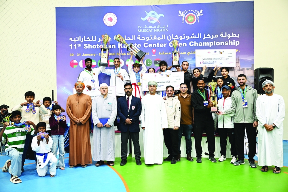 A group photo of the top four place winners. —Khalfan al Ruzaiqi