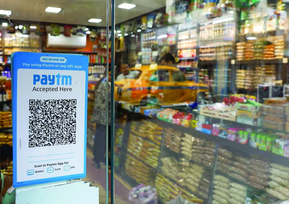 A QR code sticker of the digital payment app Paytm is seen outside a grocery store in Kolkata, India July 9, 2024. — Reuters/Sahiba Chawdhary Purchase Licensing Rights