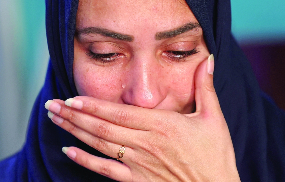 Faten Hamed Abu Watfa, a Palestinian mother who travelled to Egypt to accompany her mother-in-law for medical treatment and now longs to return to Gaza, where her three children remain, once the Rafah border crossing reopens in Cairo. - Reuters