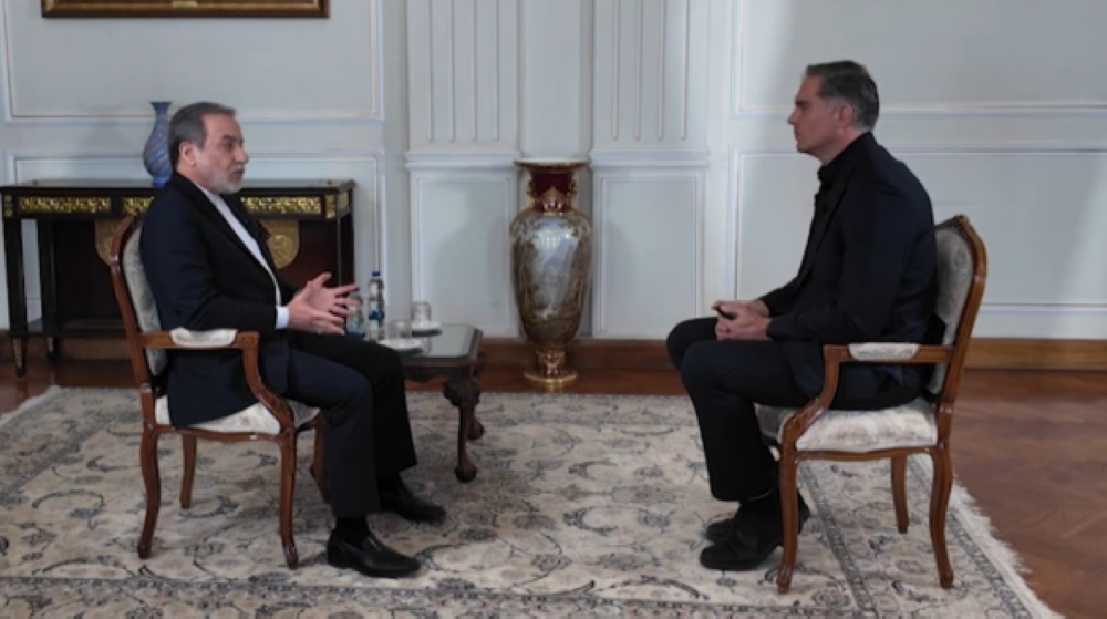 Iran's Foreign Minister Abbas Araghchi with CNN’s Fred Pleitgen 