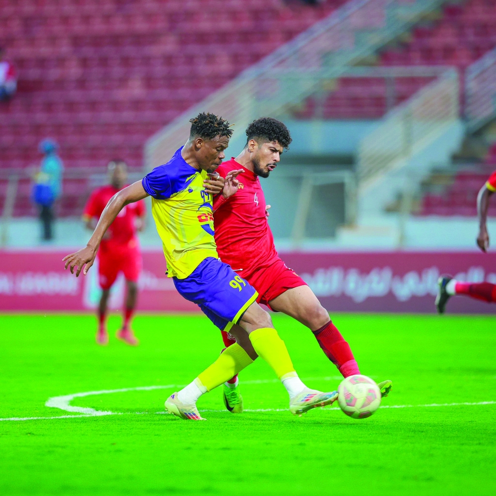 Dhofar and Ibri players in action during the Round 12 of Jindal League.