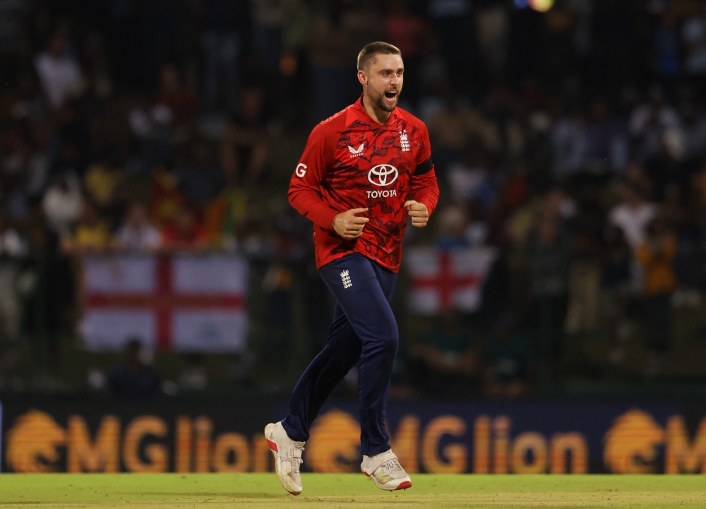 England's Will Jacks celebrates after taking the wicket of Sri Lanka's Janith Liyanage caught out by England's Jacob Bethell
