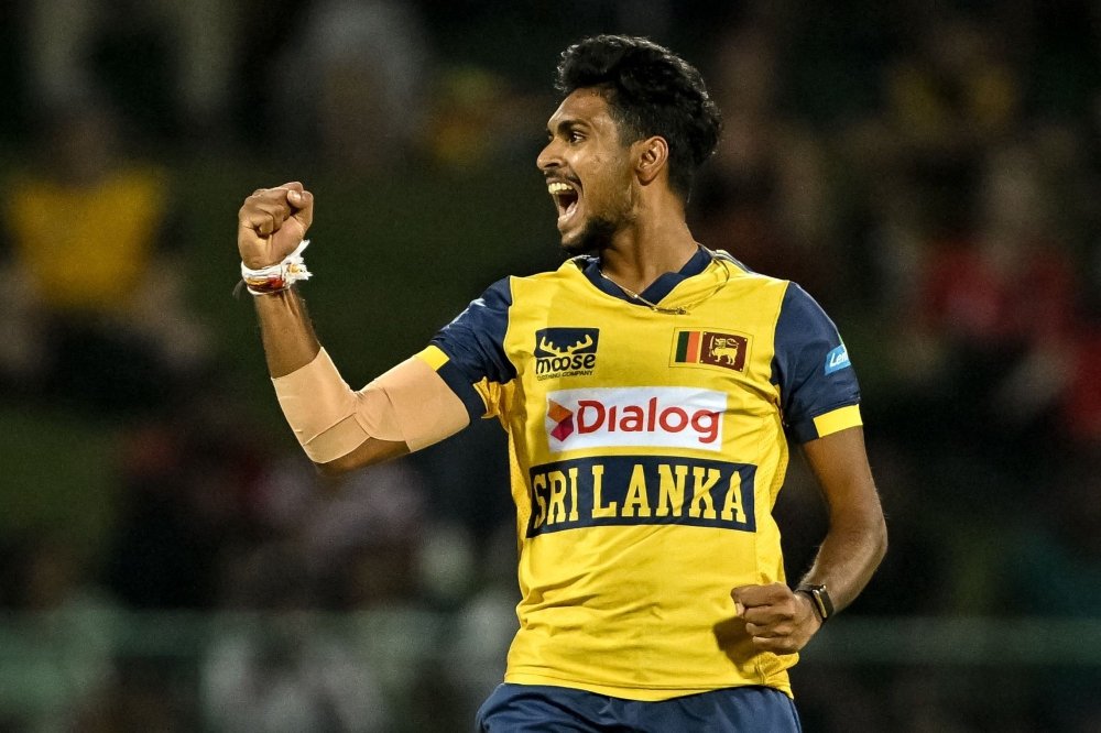 Sri Lanka's Maheesh Theekshana celebrates after taking the wicket of England's Jacob Bethell 