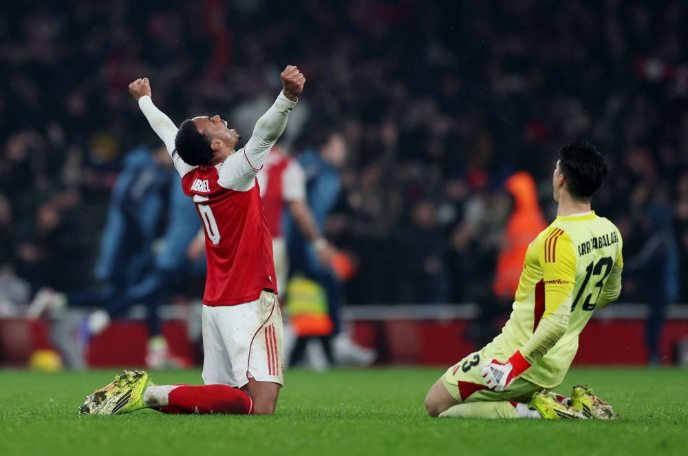 Arsenal's Gabriel Magalhaes and Kepa Arrizabalaga celebrate after Kai Havertz scores their first goal  