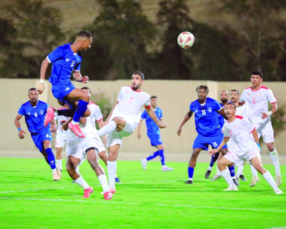 Sur and Oman Club players in action
