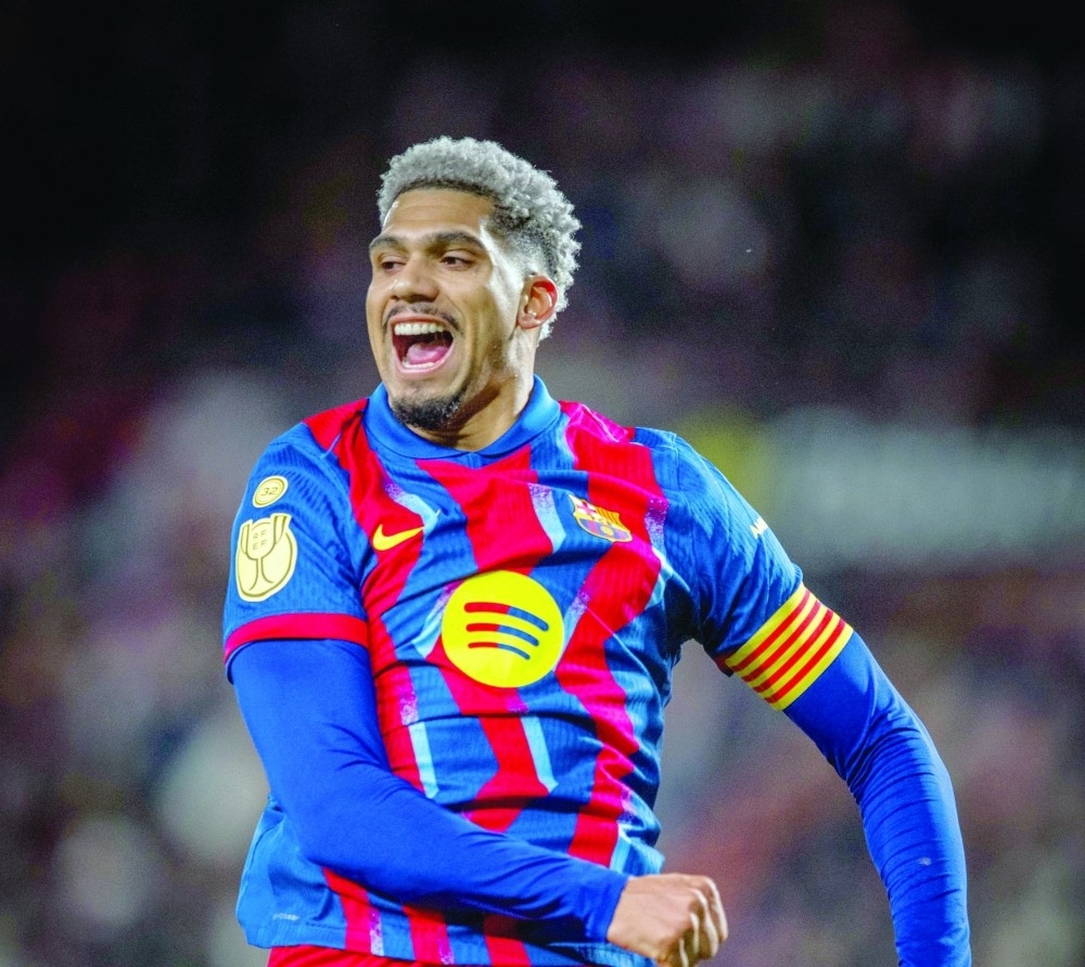 Ronald Araujo celebrates after scoring for Barcelona