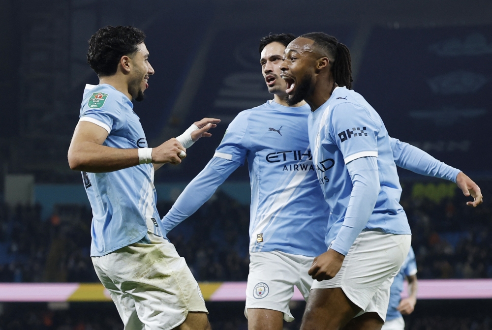  Manchester City's Omar Marmoush celebrates scoring their second goal with Tijjani Reijnders and Antoine Semenyo 