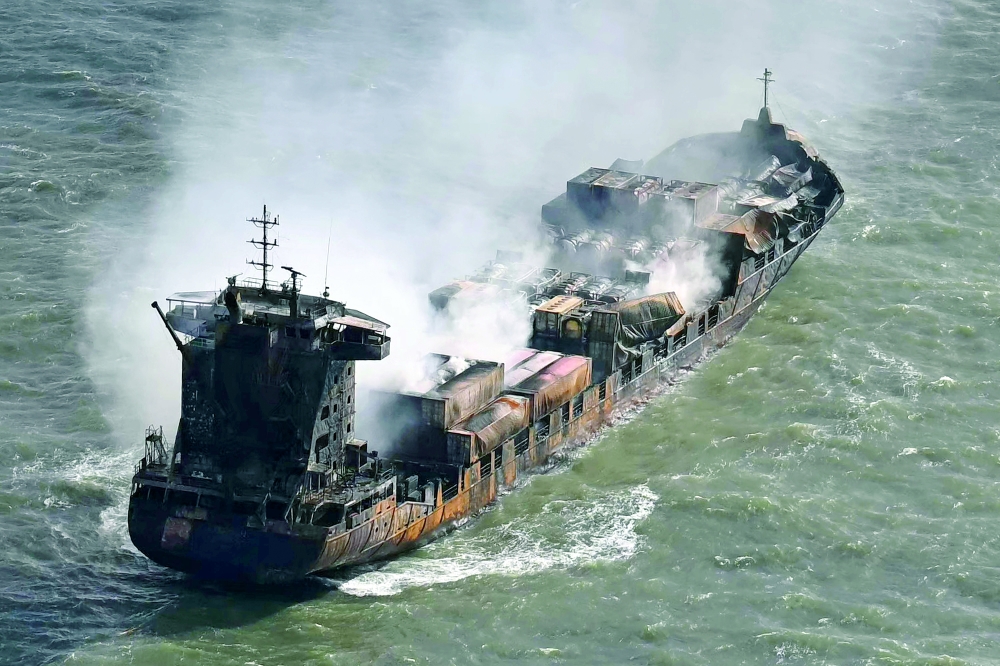 Smoke rises from the MV Solong cargo ship in the North Sea, off the coast of Withernsea, east of England, after it collided with the MV Stena Immaculate tanker. - AFP File 