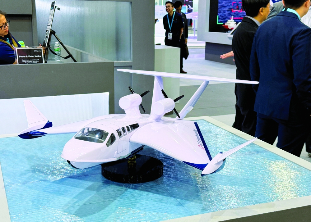 ST Engineering shows a model of its AirFish Voyager at the Singapore Airshow. — Reuters