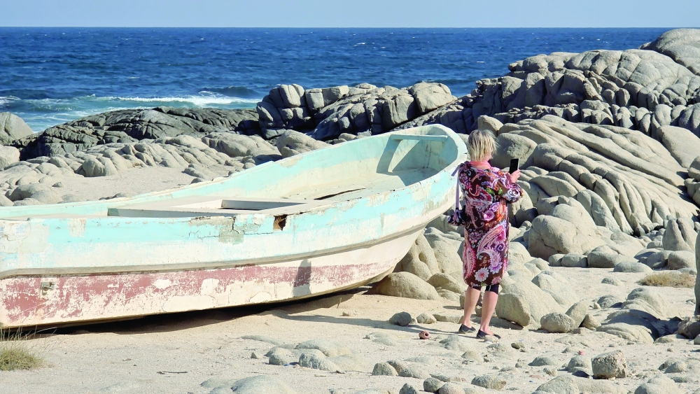 Fazayah beach with wooden boat