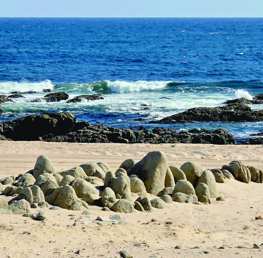 Rocky offshore shelves with waves breaking at Fazayah Beach area