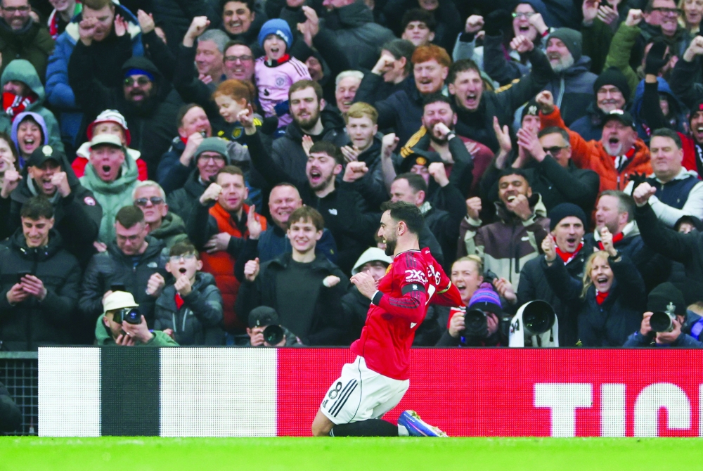 Manchester United's Bruno Fernandes celebrates scoring their second goal. — Reuters
