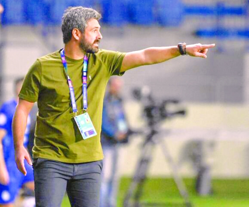 André Jasmins Al Nahda head coach.