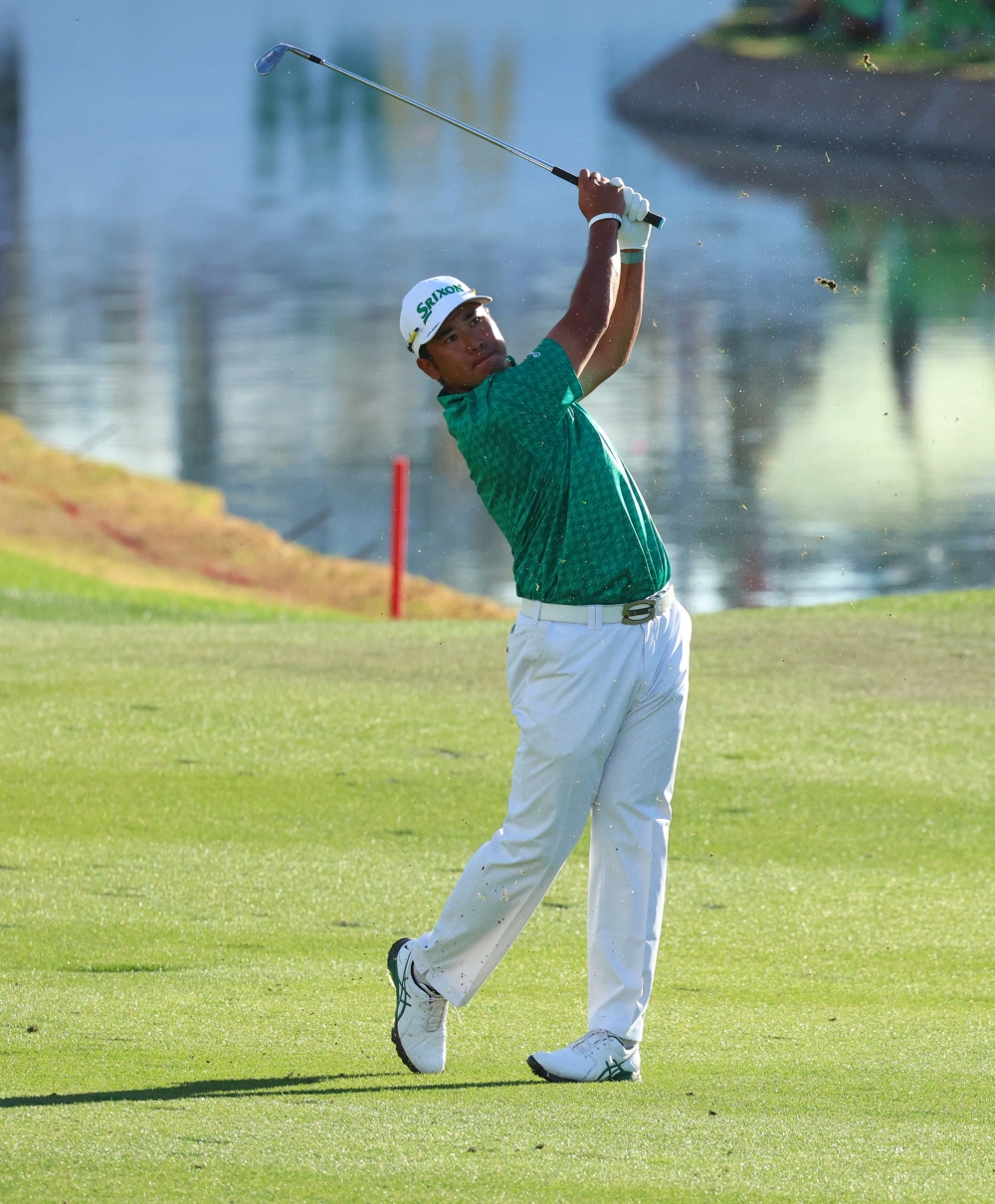  Hideki Matsuyama of the Republic of Korea hits a shot from the fairway on hole 18  