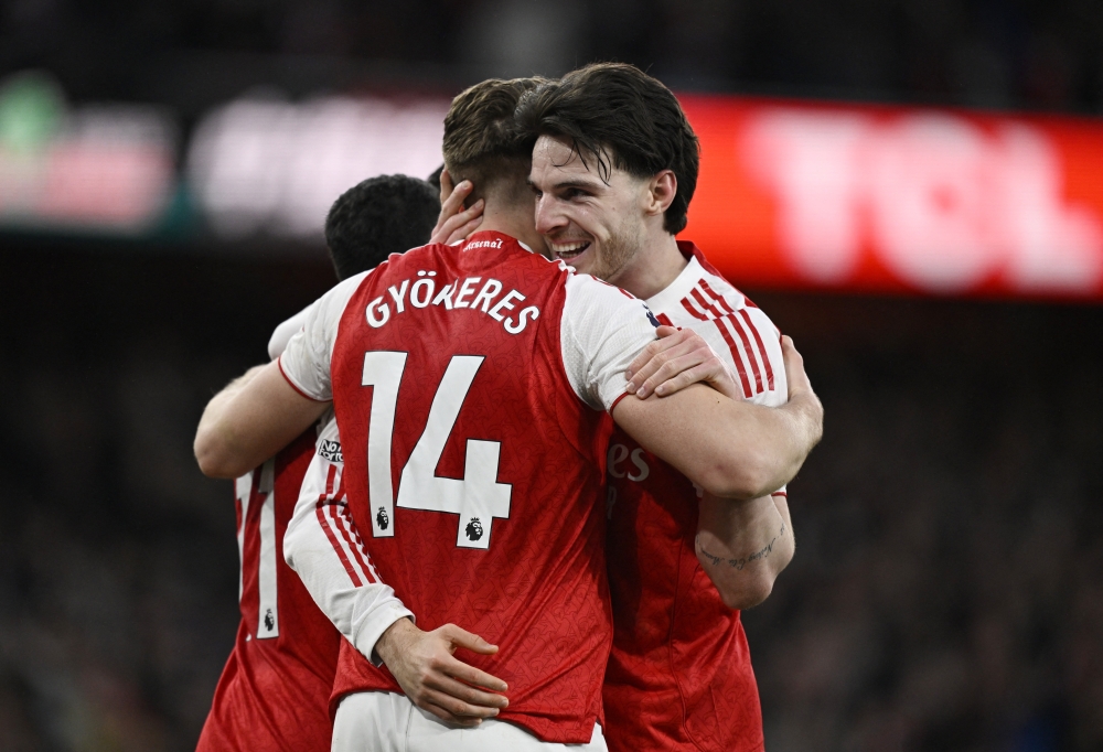   Arsenal's Viktor Gyokeres celebrates scoring their third goal with Arsenal's Declan Rice 