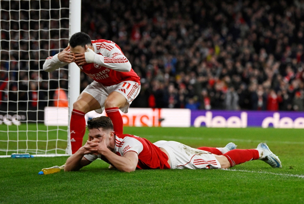   Arsenal's Viktor Gyokeres celebrates scoring their third goal with Arsenal's Gabriel Martinelli 