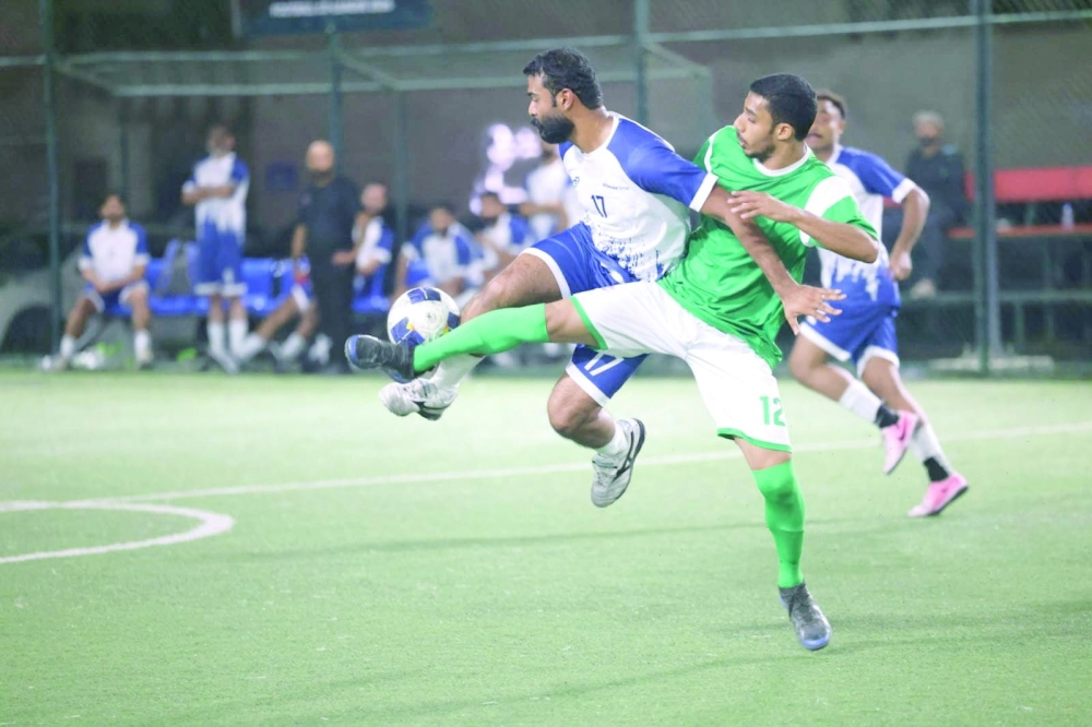 Players compete aggressively for control in a tightly fought encounter.