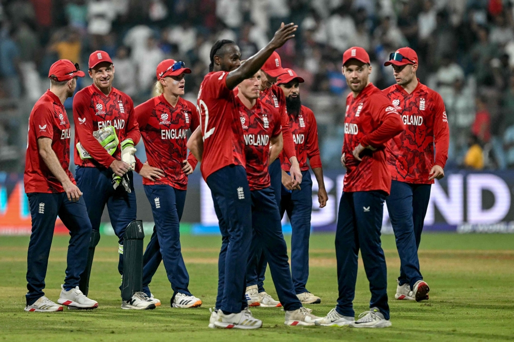 England's players celebrate their team's win 