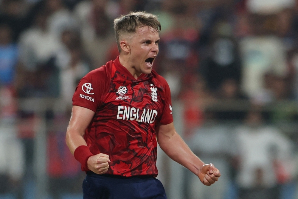  England's Sam Curran celebrates after winning the match  
