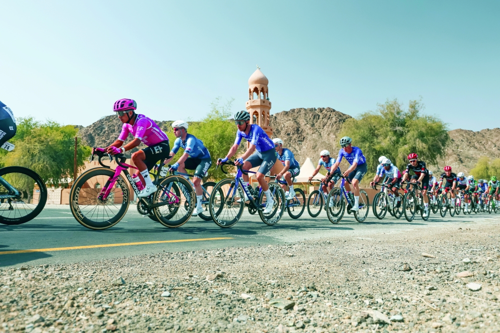 The pack rides during the 3rd stage of the Tour of Oman cycling race from Samayil "Al Fayhaa Resthouse" to Misfat Al Abriyeen.