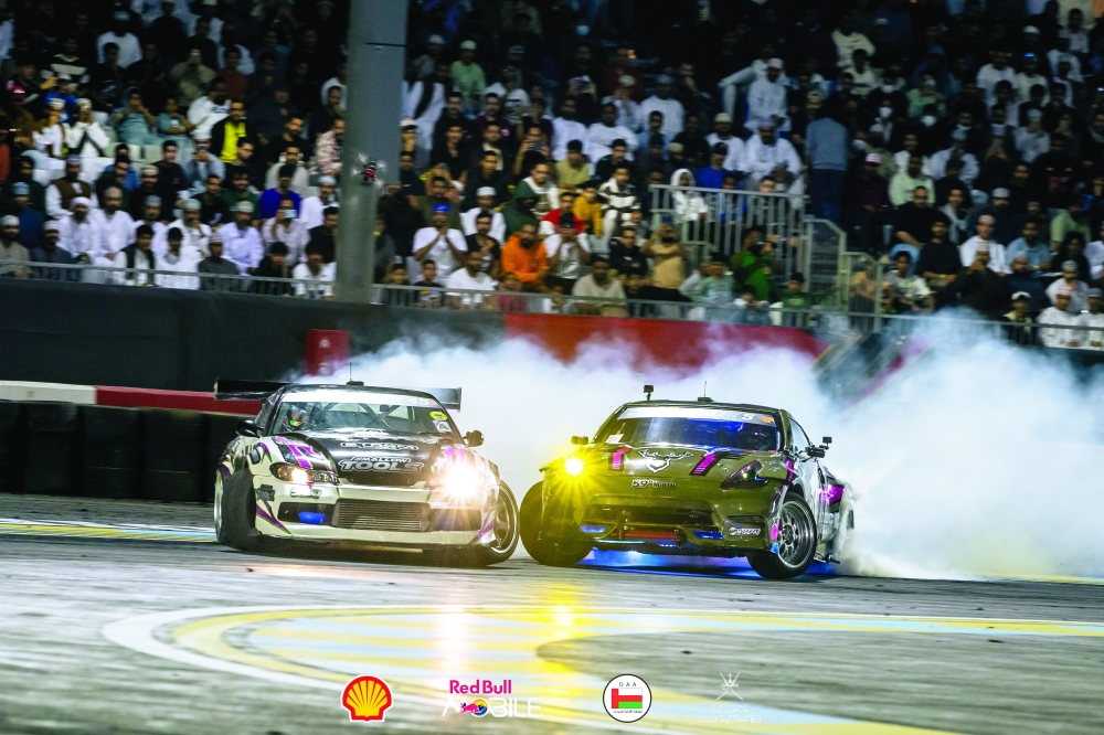 Drifting action during Round 3 at the Muscat Drift Arena.