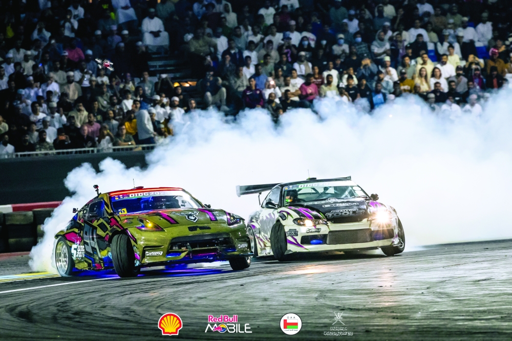 Drifting action during Round 3 at the Muscat Drift Arena.