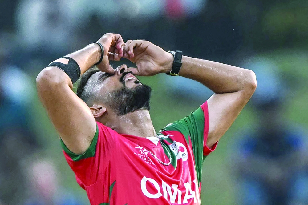 Oman's Sufyan Mehmood reacts after a delivery during the 2026 ICC Men's T20 Cricket World Cup group stage match between Zimbabwe and Oman at the Sinhalese Sports Club Ground in Colombo on February 9, 2026.  (Photo by Ishara S. KODIKARA / AFP)
