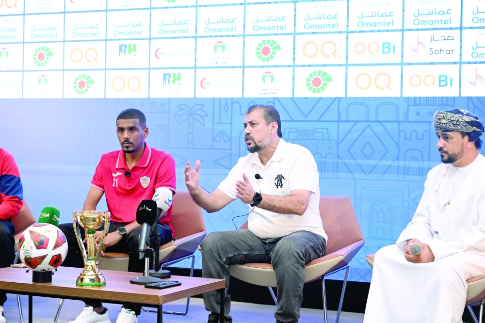 Oman Club head coach Idris al Marabout (C) during the press conference.