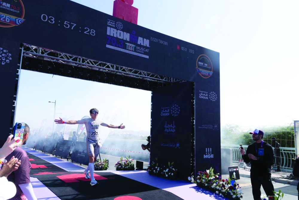 An athlete crosses the finish line.