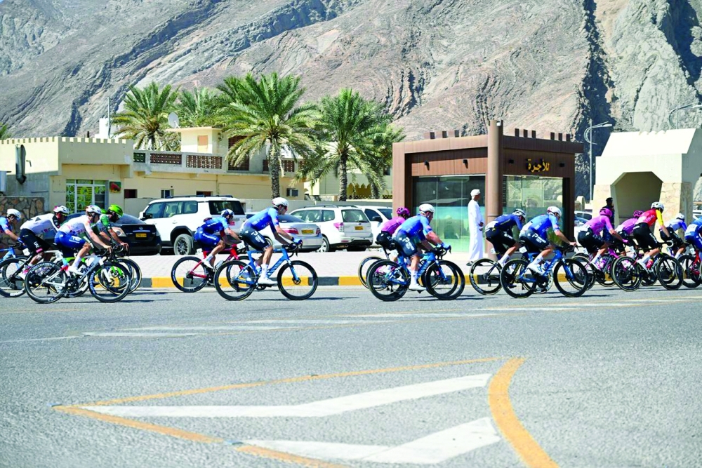 Cyclists in action during Tour of Oman 2026. 