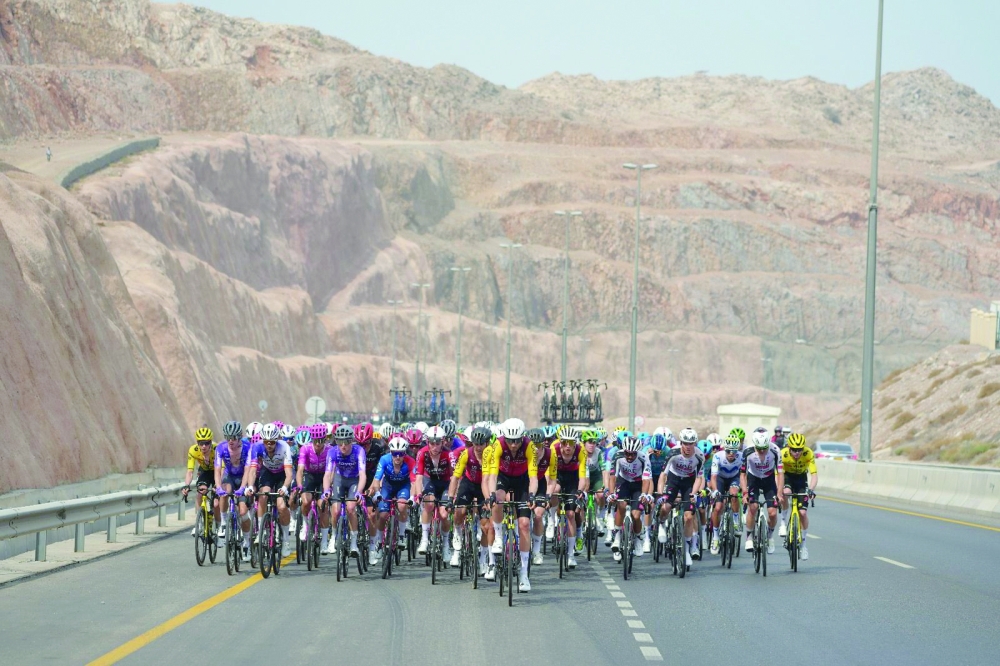 Cyclists in action during Tour of Oman 2026. 