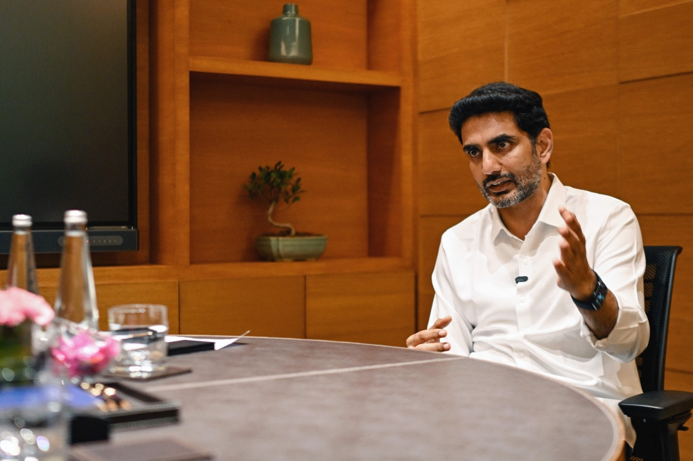 This photograph, taken on January 4, 2026, shows Nara Lokesh, Minister for Information Technology in India's Andhra Pradesh state, 