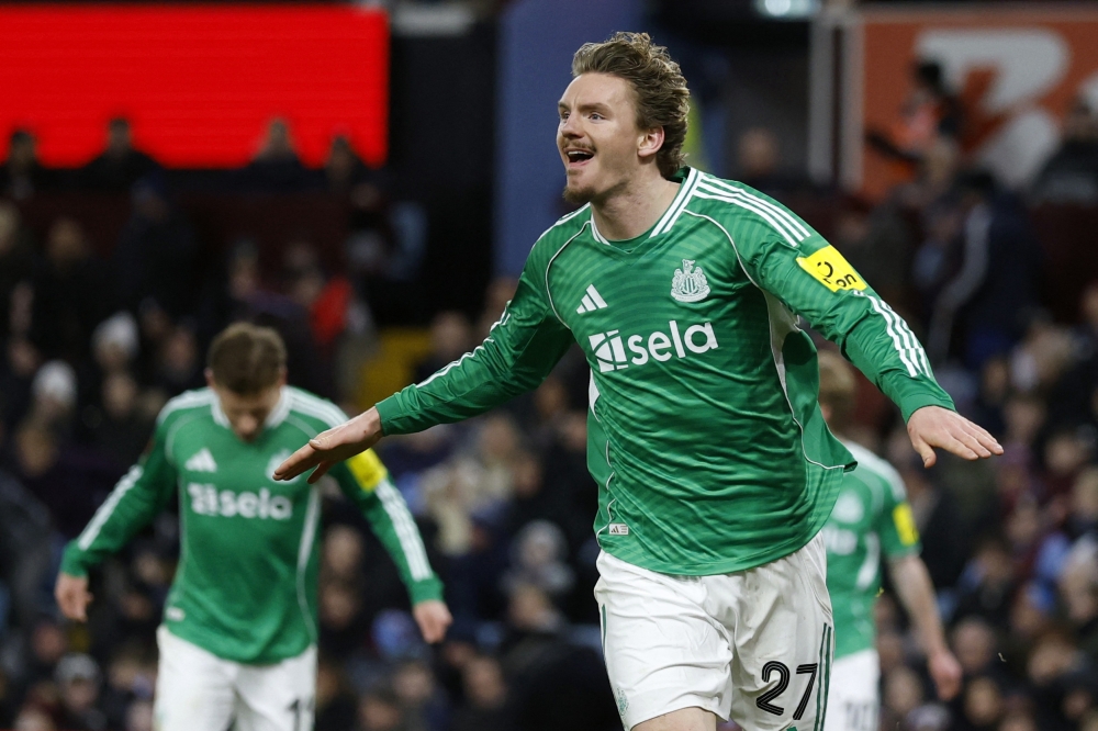 Newcastle United's Nick Woltemade celebrates scoring their third goal 