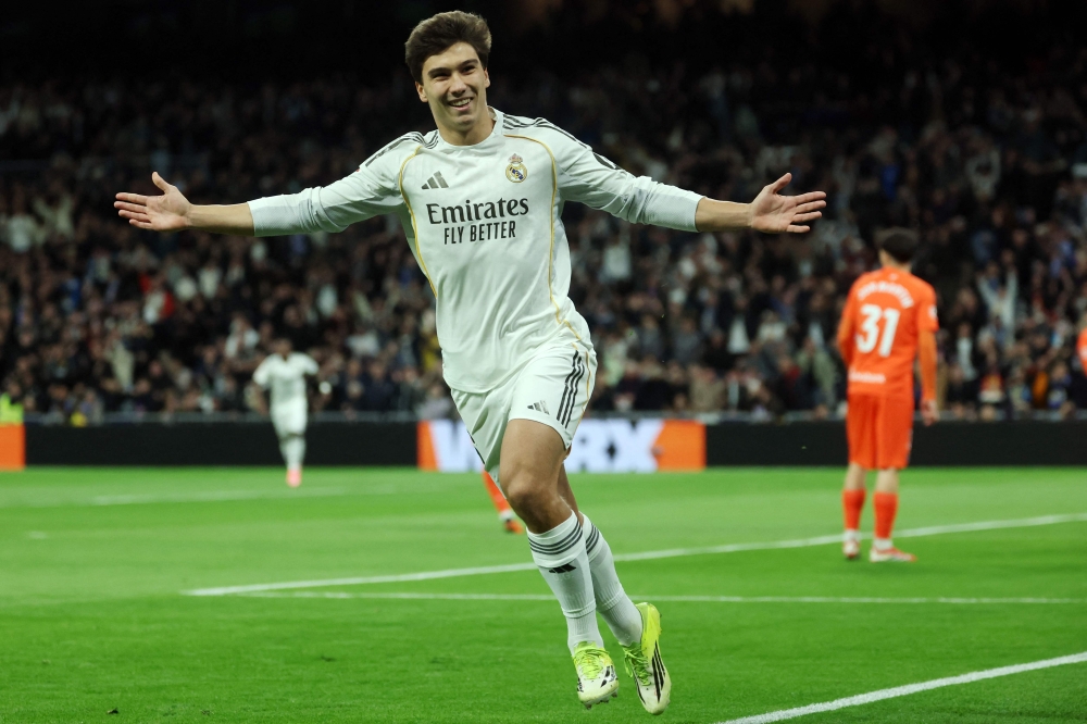 Spanish forward #16 Gonzalo Garcia celebrates scoring the opening goal 

