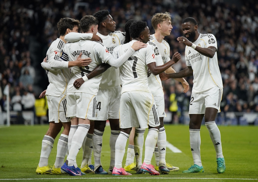  Real Madrid's Federico Valverde celebrates scoring their third goal with teammates 