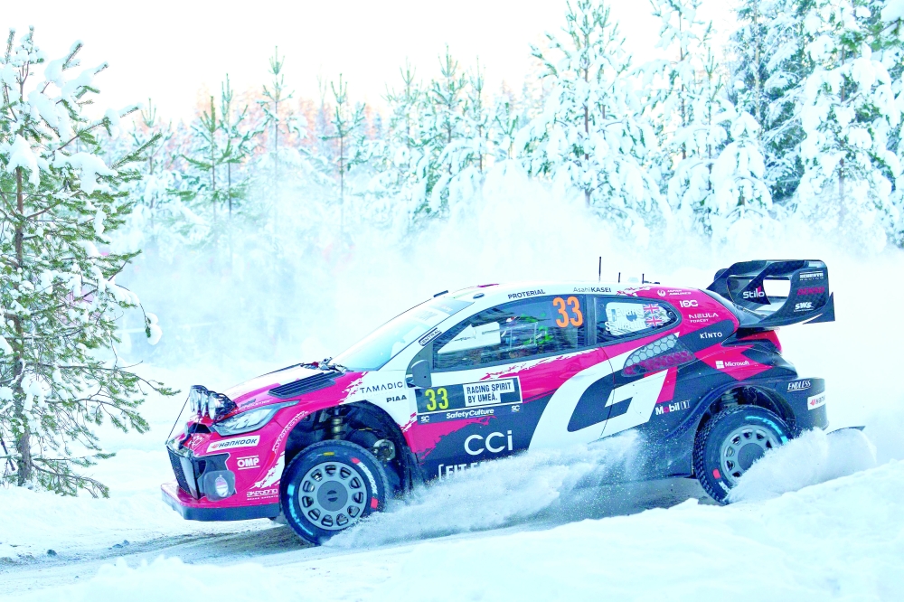 British driver Elfyn Evans and co-driver Scott Martin compete in their Toyota GR Yaris during Rally Sweden. — AFP