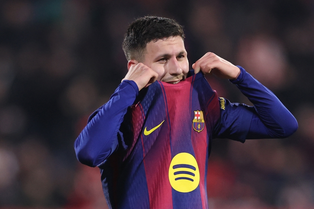 Barcelona's Swedish forward #19 Roony Bardghji reacts after losing 