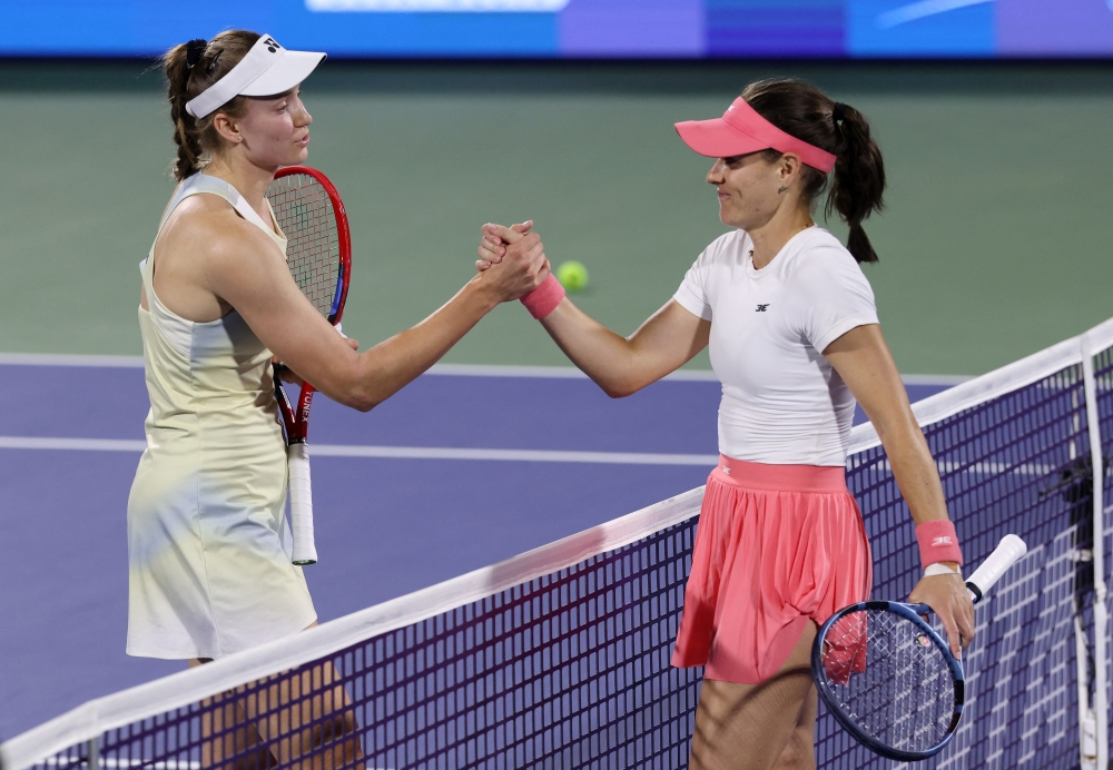   Kazakhstan's Elena Rybakina shakes hands with Australia's Kimberly Birrell 