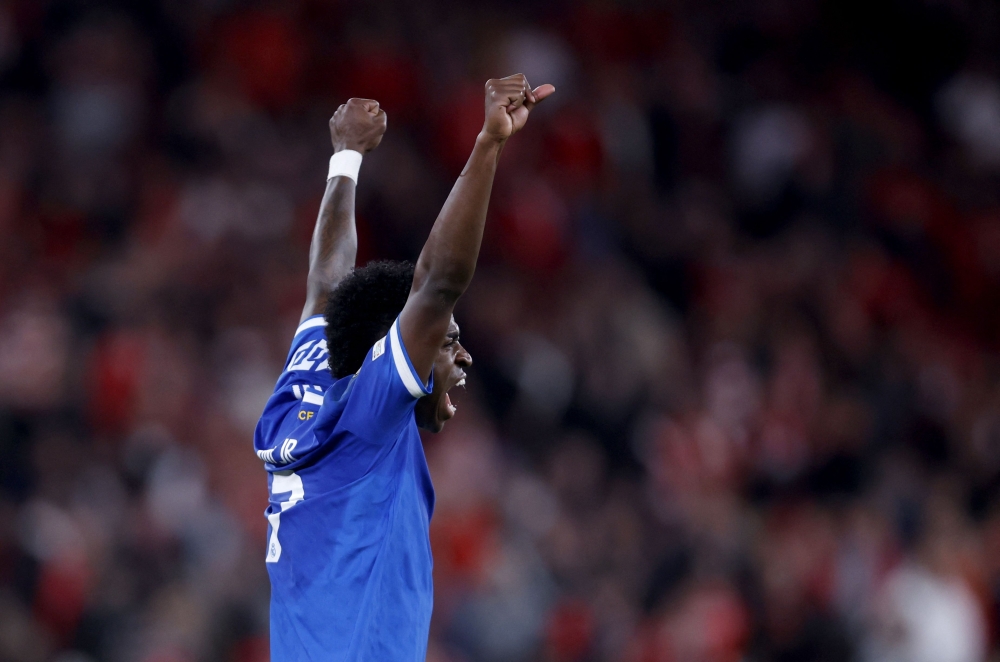 Real Madrid's Brazilian forward #07 Vinicius Junior celebrates victory at the end  