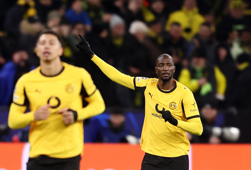  Borussia Dortmund's Serhou Guirassy celebrates scoring their first goal  