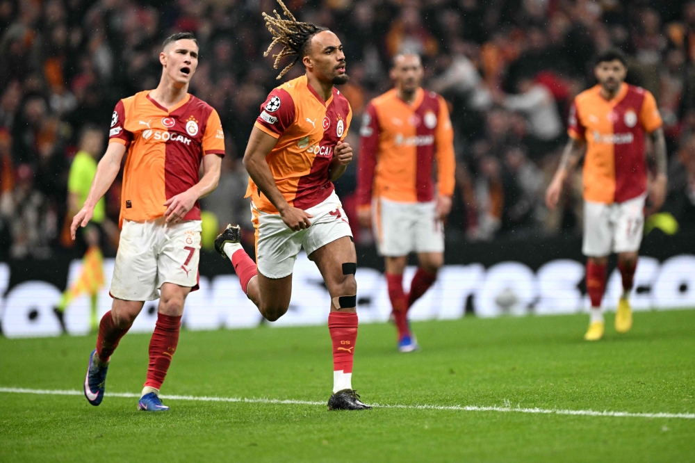 Galatasaray's French defender #93 Sacha Boey celebrates scoring his team's fifth goal  